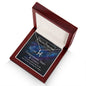 Overhead view of a Gold Pisces Necklace in Mahogany Style Box